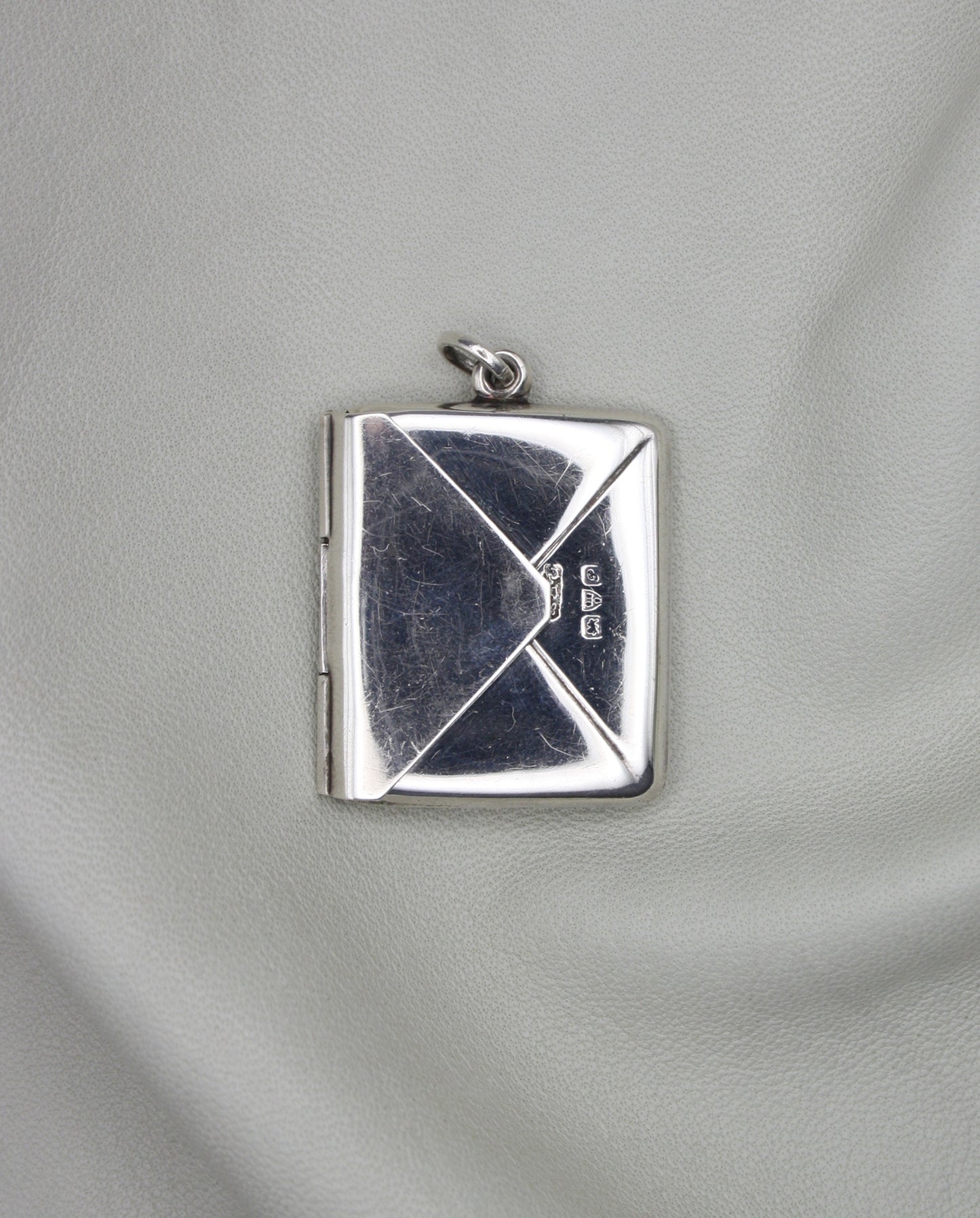 SILVER STAMP CASE PENDANT