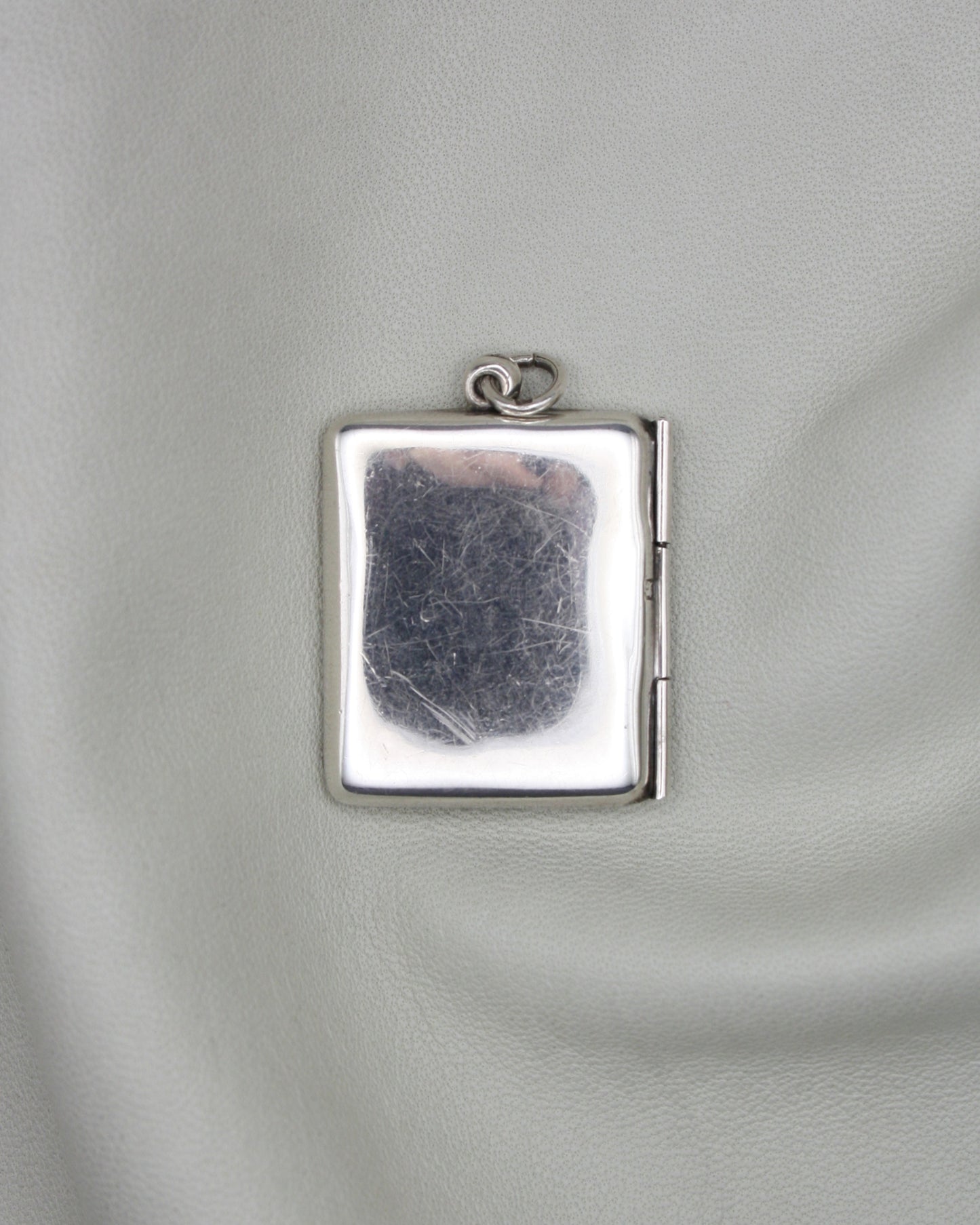 SILVER STAMP CASE PENDANT