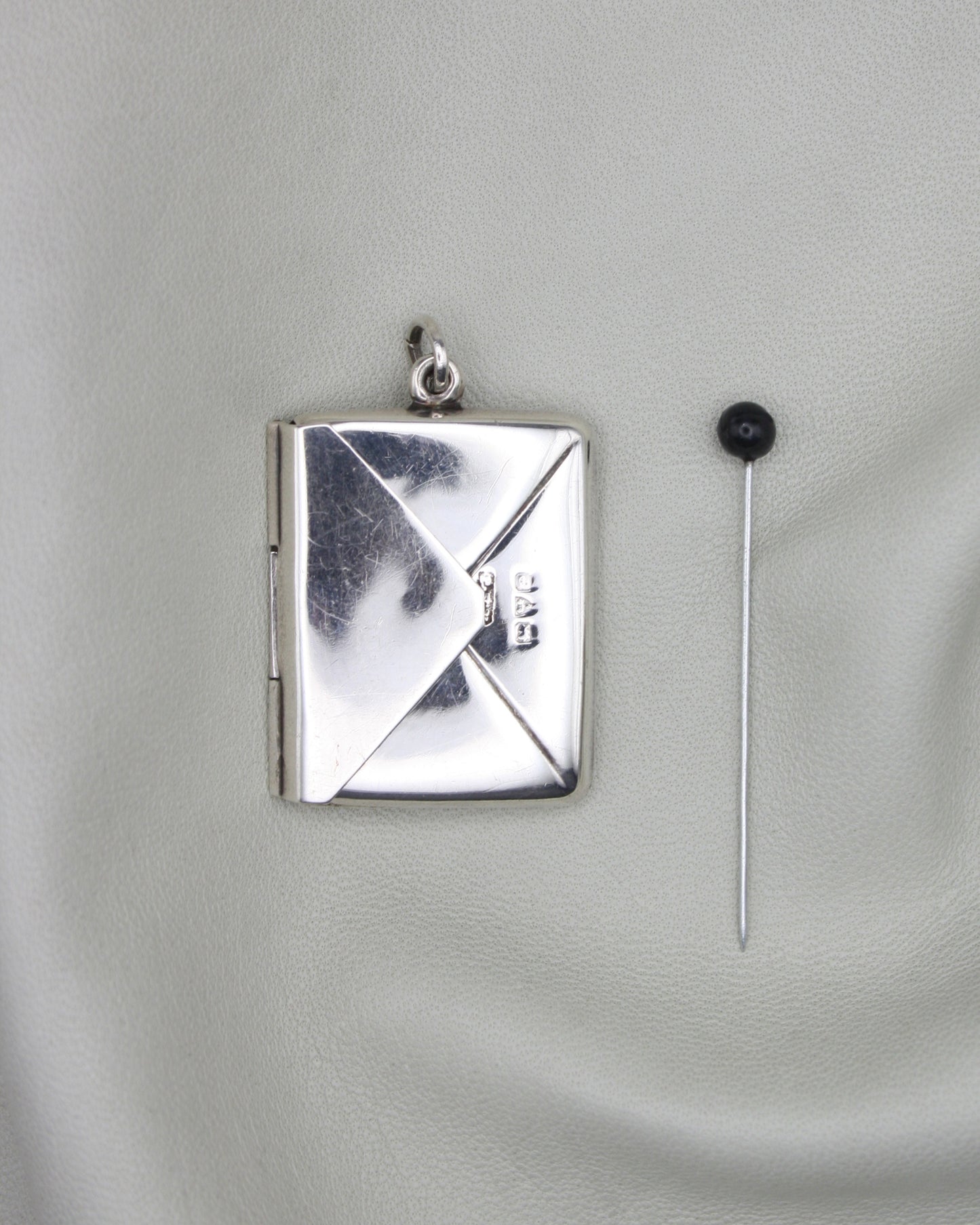 SILVER STAMP CASE PENDANT