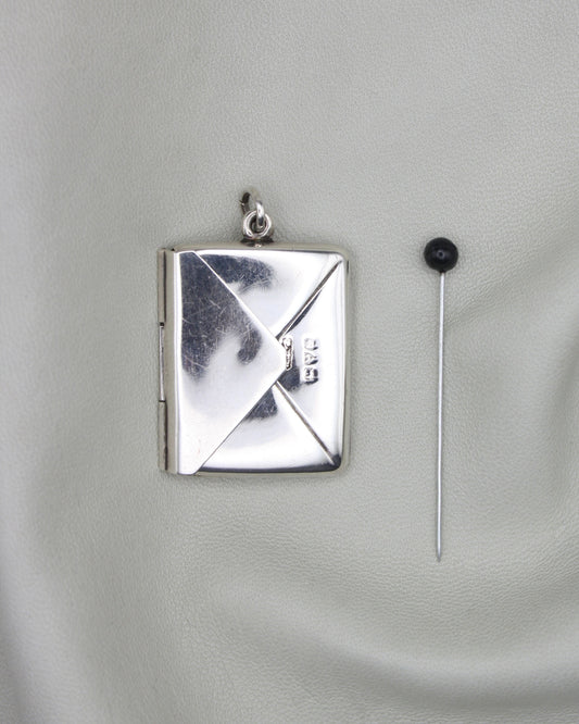 SILVER STAMP CASE PENDANT