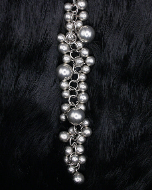 DANGLING SPHERES SILVER PLEATED BRACELETE